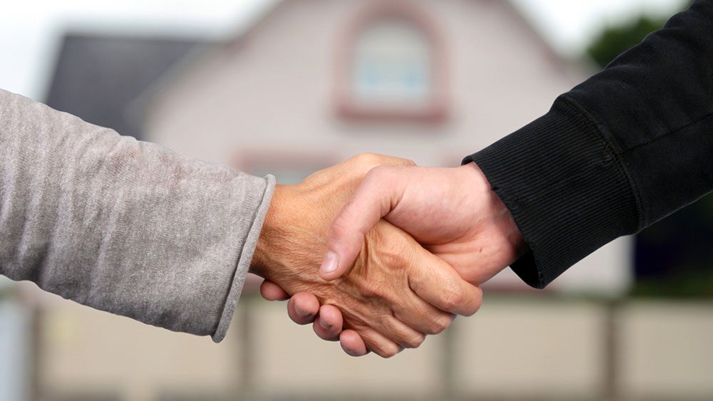 Handshake after buying a home