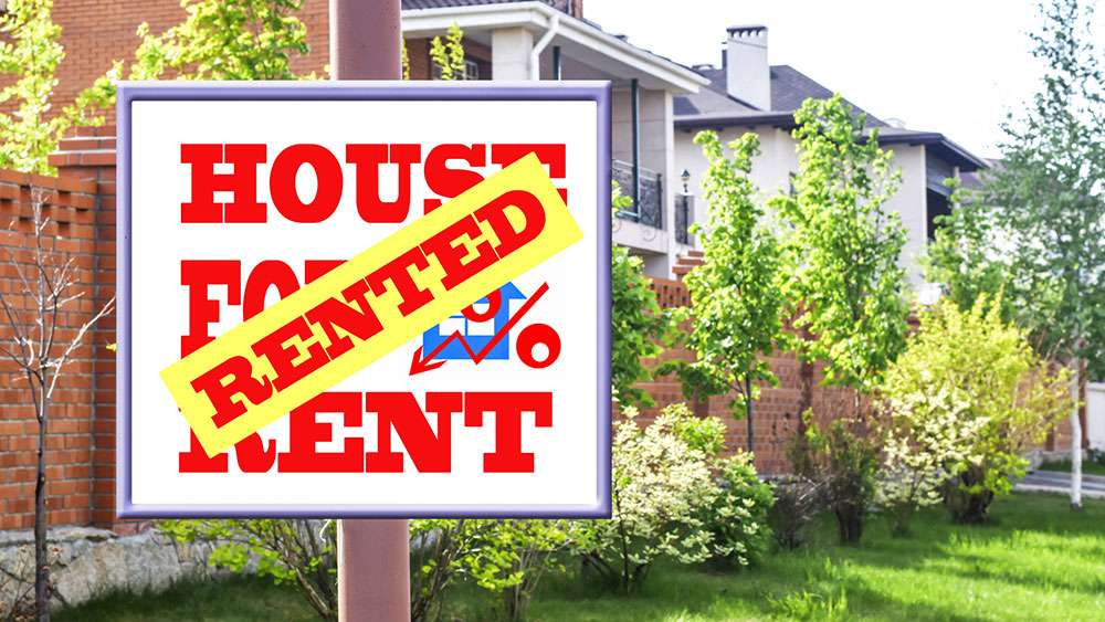 Yard sign advertising the rental of a home